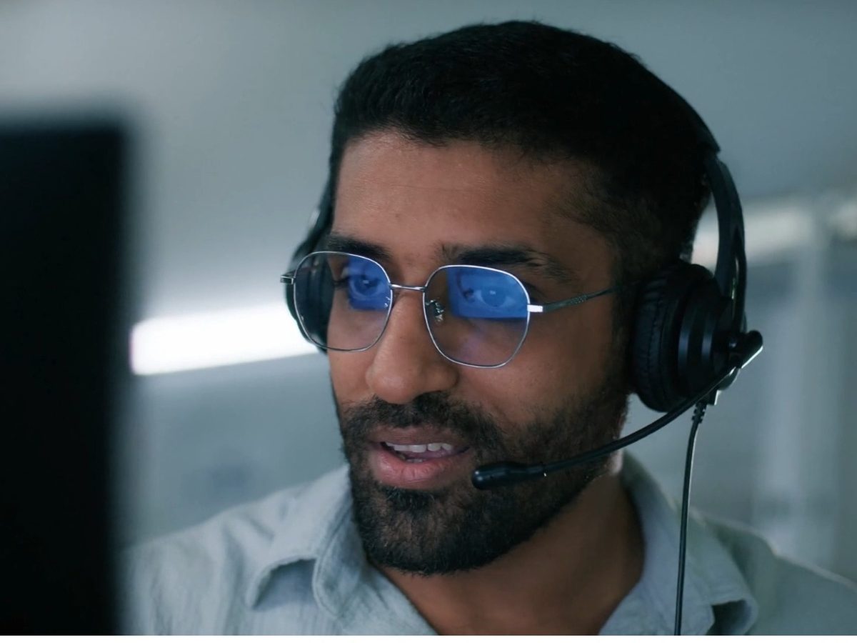 An interpreter wearing a headset